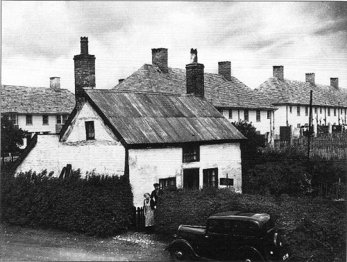 Jack Ireland's cottage in Speke Town Lane, with new houses in School Way behind.