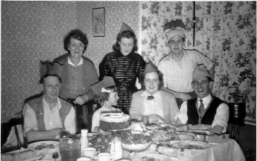 George with Doris, Vera, Brian, Lyn, Edna and Reg at Bray Road, probably Christmas 1956.