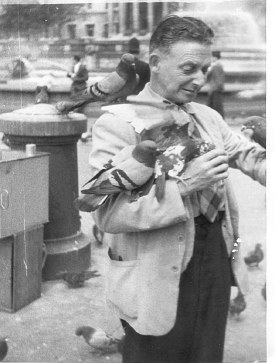 George feeding the pigeons in Trafalgar Square, London, 1961.
