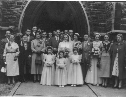 Reg and Edna's wedding, 1st October 1955, showing George with family.